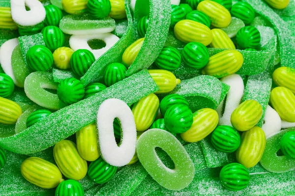 Blandade gröna gummy godis bakgrund. Högst upp. Gelégodis — Stockfoto