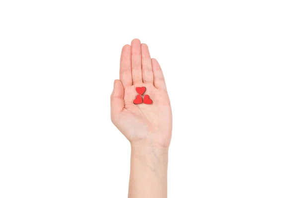 Coração vermelho na mão mulher isolado . — Fotografia de Stock