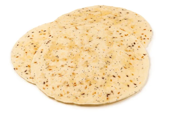 Pitta bread with seeds isolated on white — Stock Photo, Image