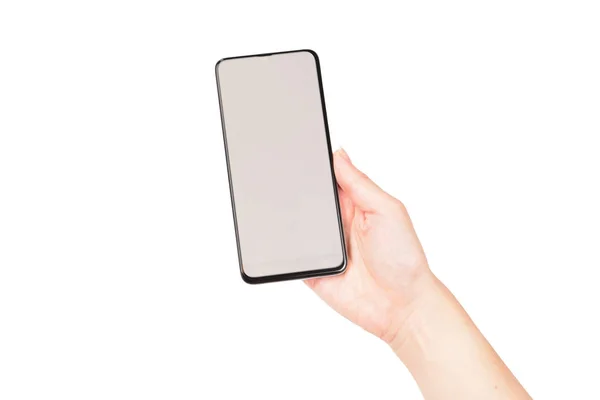 Smart telefon i kvinnan händer isolerade på vit bakgrund. Vit — Stockfoto