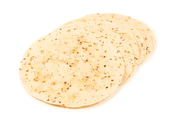 Pitta bread with seeds isolated on white — Stock Photo, Image