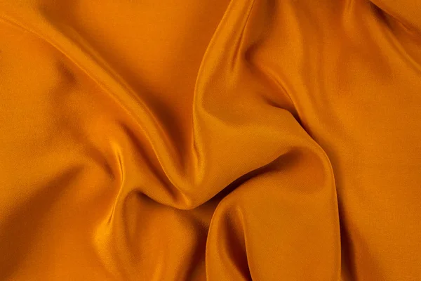 Seda dourada ou cetim textura de tecido de luxo pode usar como b abstrato — Fotografia de Stock