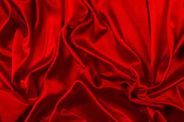 Czerwony jedwabiu lub satynowa luksusowa tkanina tekstura może używać jako streszczenie z powrotem — Zdjęcie stockowe