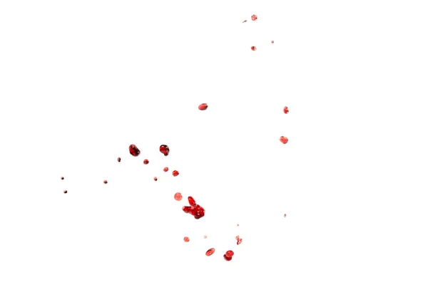 Красные пятна изолированы на белом фоне — стоковое фото