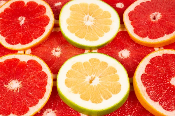 Pomelo e toranja fatias fundo . — Fotografia de Stock