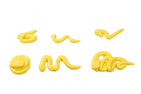 Żółty sos serowy rozpryski izolowane na białym tle — Zdjęcie stockowe