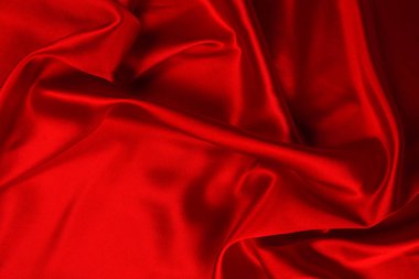 Kırmızı ipek veya sadan lüks kumaş doku soyut geri olarak kullanabilirsiniz
