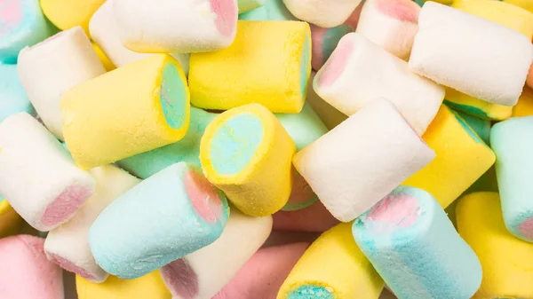 Färgglada välsmakande marshmallow bakgrund. — Stockfoto