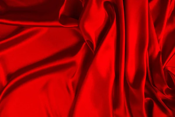 Seda vermelha ou cetim textura de tecido de luxo pode usar como abstrato de volta — Fotografia de Stock