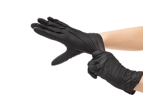 Kadın siyah lastik eldiven giyer.. — Stok fotoğraf