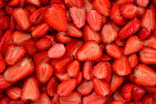 Φέτες φράουλας. Φρέσκα μούρα. Φόντο φρούτων. Τοπ Βι — Φωτογραφία Αρχείου