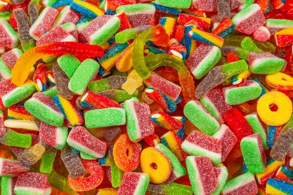 Verschiedene Gummibärchen. Ansicht von oben. Gelee-Bonbons Hintergrund. — Stockfoto