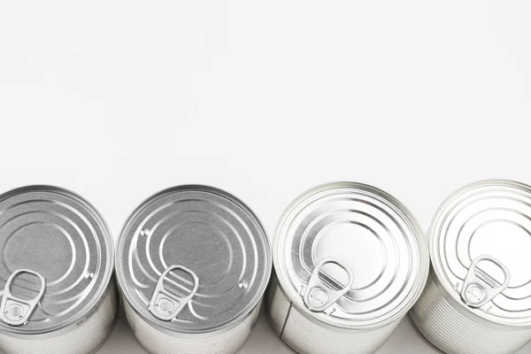 Group of silver canned food on white background. — Stock Photo, Image