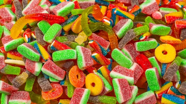 맛있는 사탕을 준비 했어. 위에서 본 모습. 젤리 사탕의 배경. — 스톡 사진