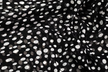 Black and white polka dots fabric texture. 
