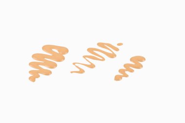 Beyaz arka planda izole edilmiş sıvı temel örneği. Yakın çekim 