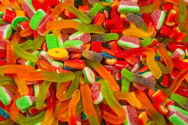 Verschiedene Gummibärchen. Ansicht von oben. Gelee-Bonbons Hintergrund. — Stockfoto