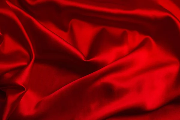 Czerwony jedwabiu lub satynowa luksusowa tkanina tekstura może używać jako streszczenie z powrotem — Zdjęcie stockowe