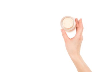 El kremi beyaz arka planda izole edilmiş. Kadın elleri. 