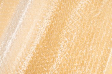 Kabarcık ambalaj bej arka plan. Üst görünüm. 