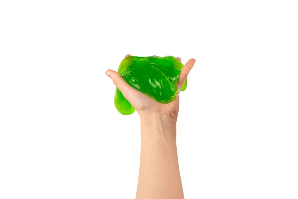 Zielony Szlam Zabawka Kobieta Ręka Odizolowany Biały Widok Góry — Zdjęcie stockowe