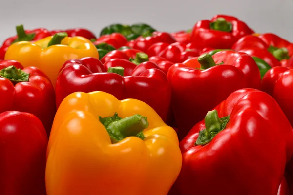 Fresh red, green, yellow bell pepper background. Top view.