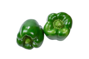 Beyaz arka planda izole edilmiş bir grup yeşil dolma biber. Üst görünüm. 