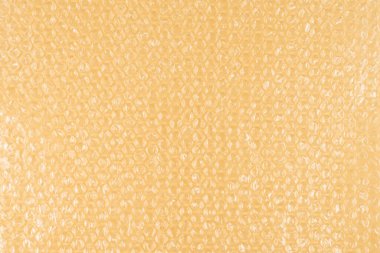 Kabarcık ambalaj bej arka plan. Üst görünüm. 