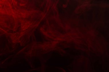 Siyah arka planda kırmızı buhar. Boşluğu kopyala.