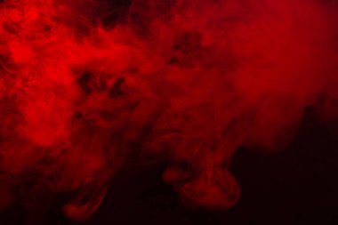 Siyah arka planda kırmızı buhar. Boşluğu kopyala.