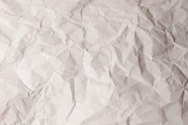 Crumpled white paper background. Top view.