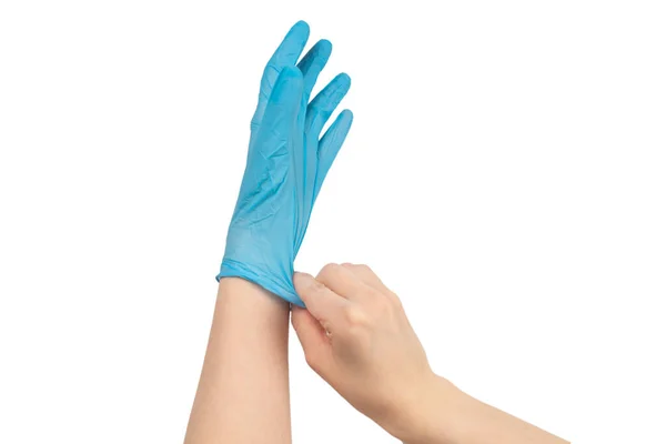 女人戴上蓝色橡胶手套 与白种人隔离 — 图库照片