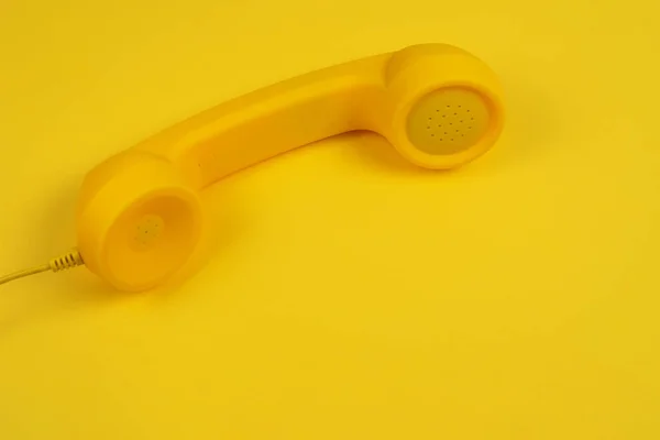 Auricular Amarillo Sobre Fondo Amarillo Copiar Espacio —  Fotos de Stock