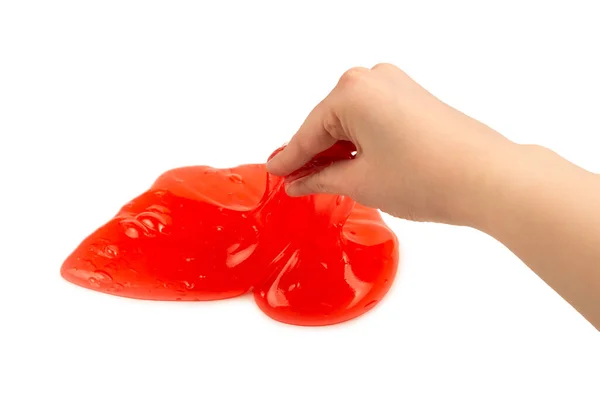 红色黏液玩具在女人手里 与白色隔离 顶部视图 — 图库照片
