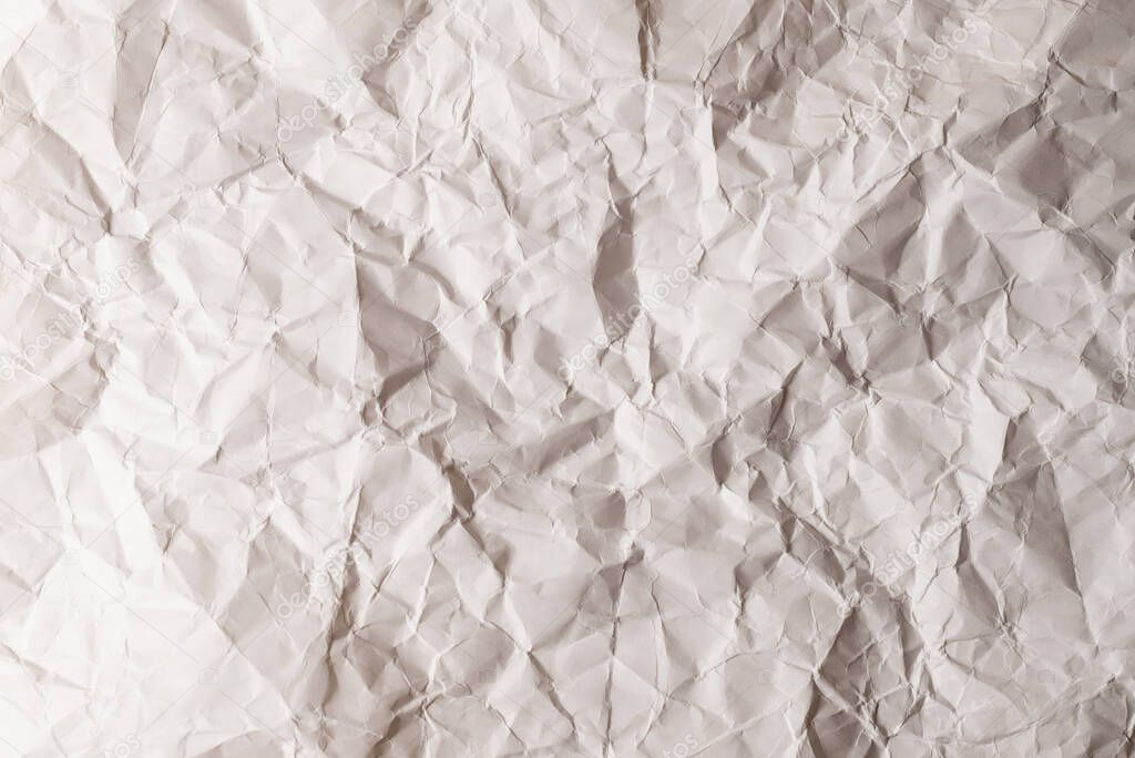 Crumpled white paper background. Top view. 