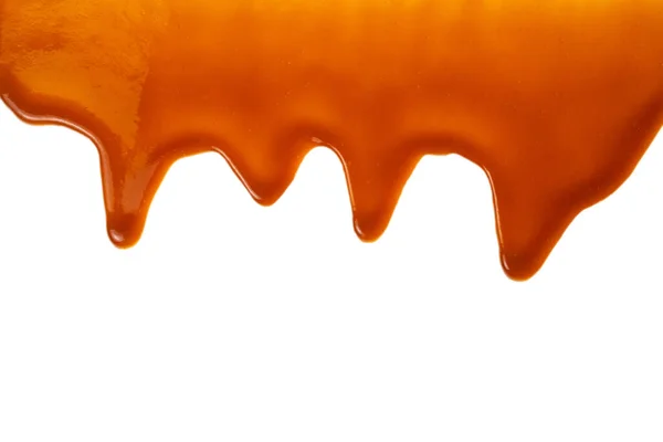 Fondo Salsa Caramelo Fluido Aislado Blanco Copiar Espacio —  Fotos de Stock
