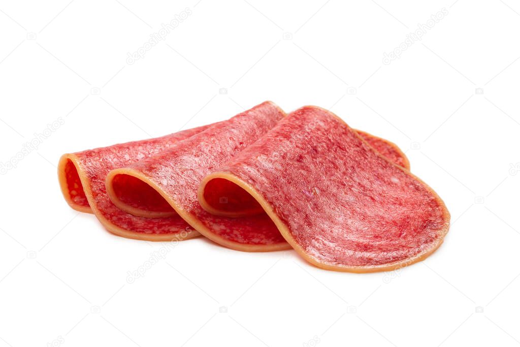Tasty salami slices isolated on white background. 