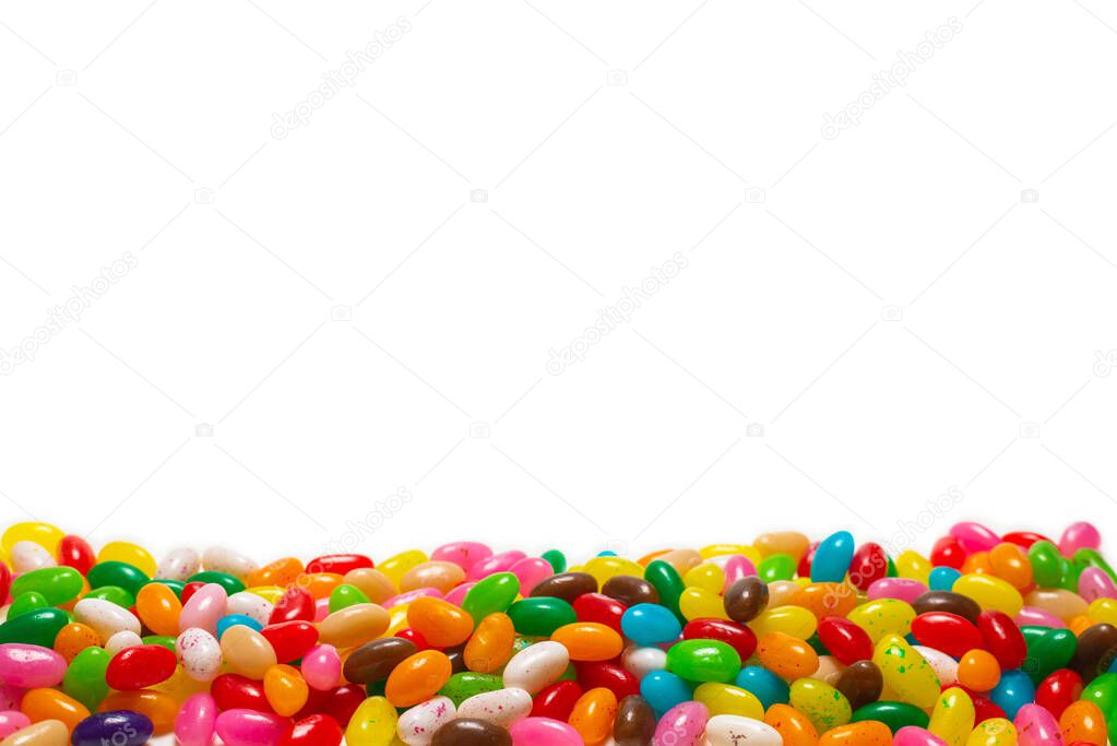 Colorful jelly beans isolated on white. Top view. 