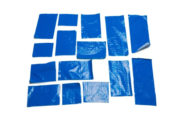 Blauwe Scotch Tape Stukken Geïsoleerd Witte Achtergrond — Stockfoto