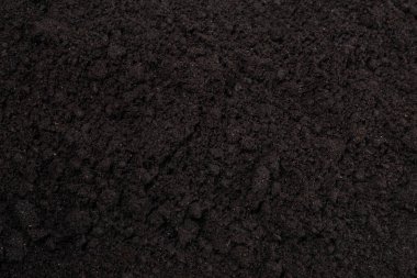Black land for plant background. Top view.  clipart
