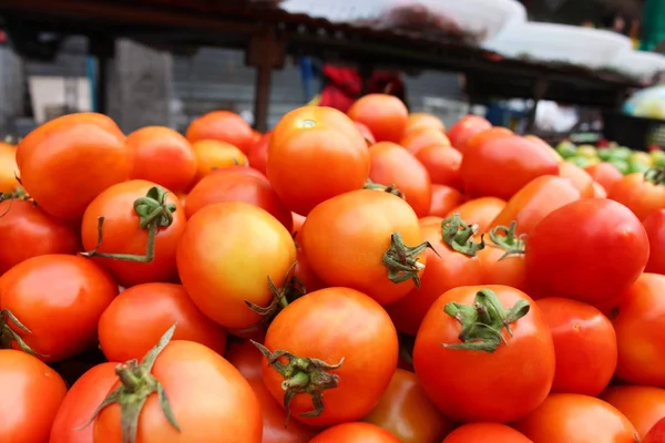tomatoes in grocery market. (closeup)