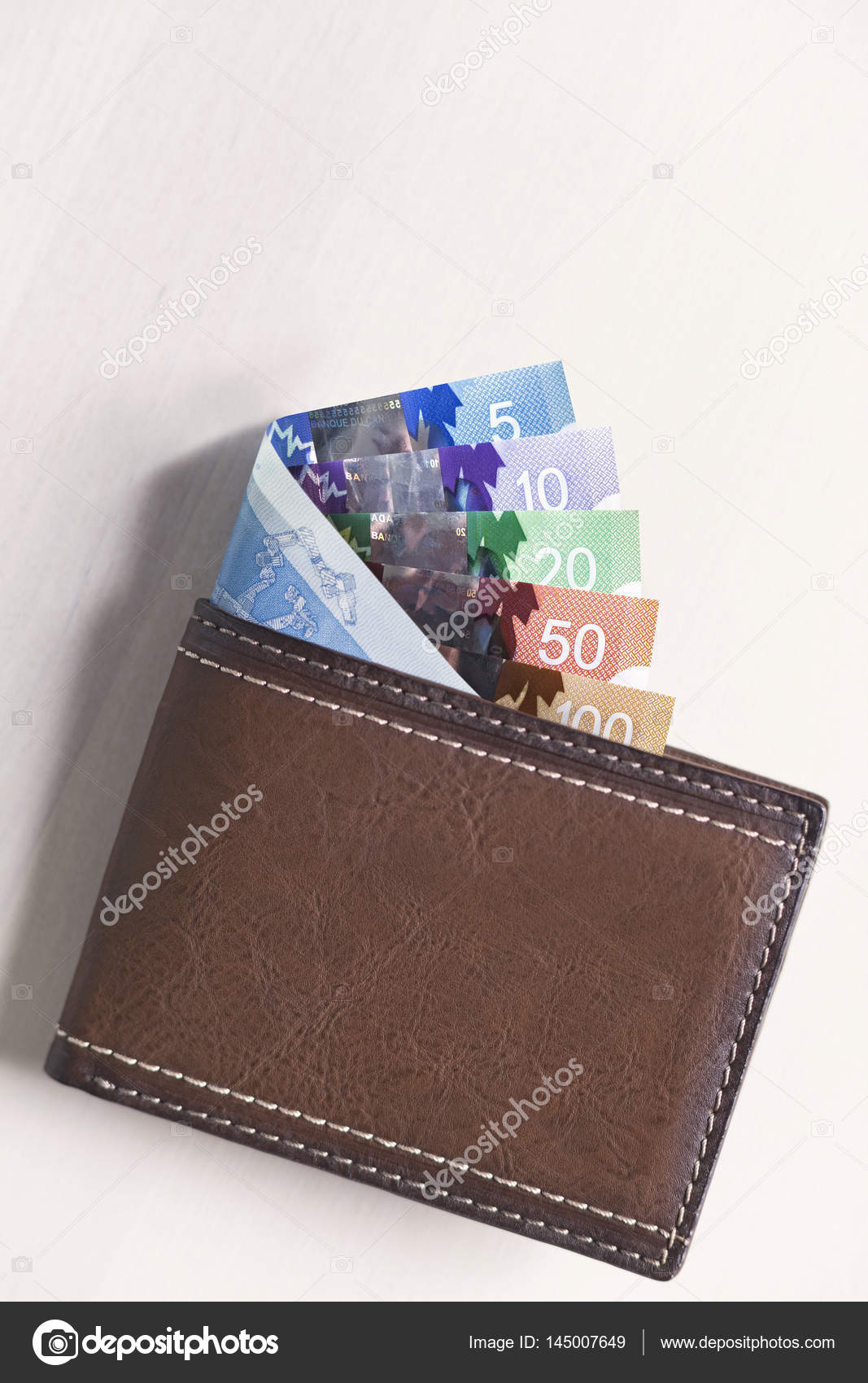 Canadian Dollars in leather wallet Stock Photo by ??ikinciadres 145007649
