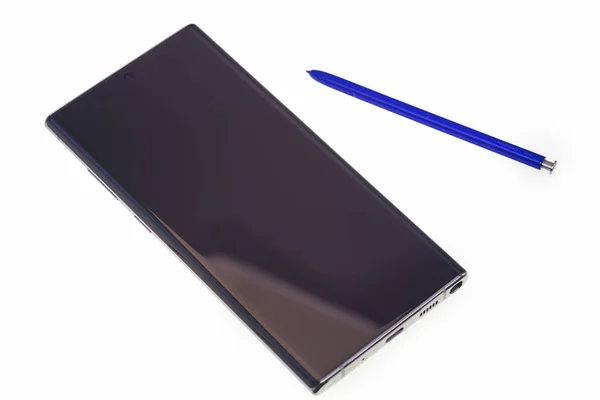 Note-Smartphone mit Stift isoliert — Stockfoto