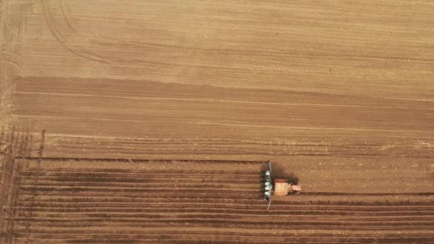 Above view of agriculture machinery on spring field — Stock Video