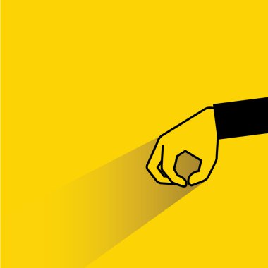 sarı arka planda gölge ile el ezmek