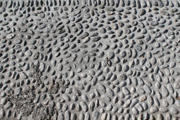 Bonita imagen de fondo de guijarros, textura de rocas redondas — Foto de Stock