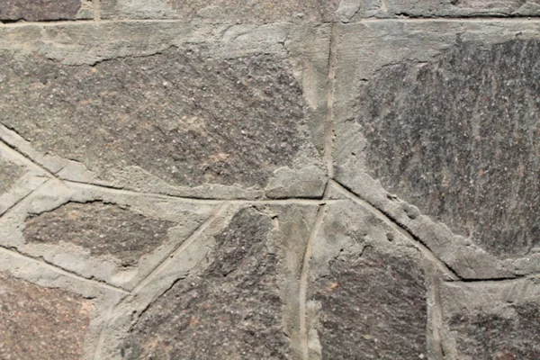 Текстура каменной стены, треснувшая поверхность — стоковое фото