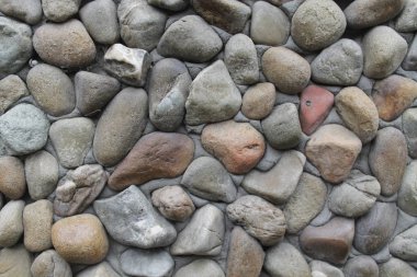 Duvar taşı. Sarı ve kahverengi çakıl