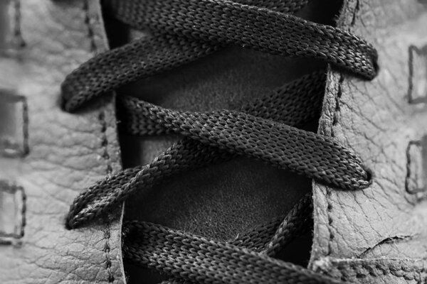 Red laces and red shoes.