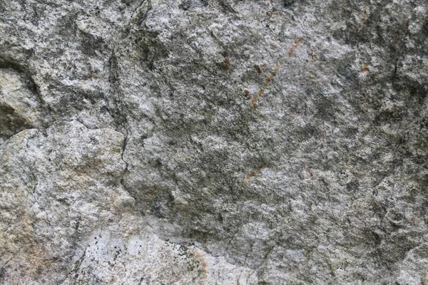 Šedý kámen s praskliny na povrchu. — Stock fotografie